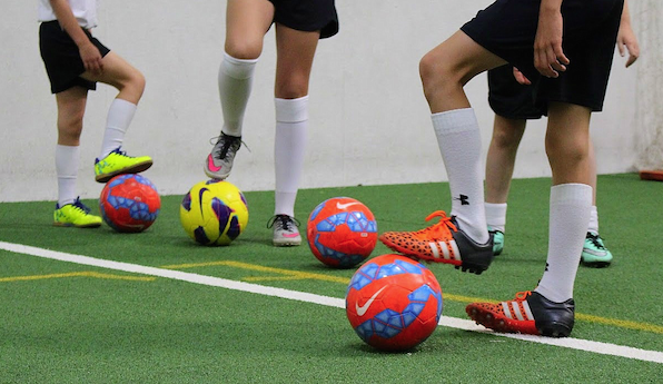 Feet of Soccer Players at Camp